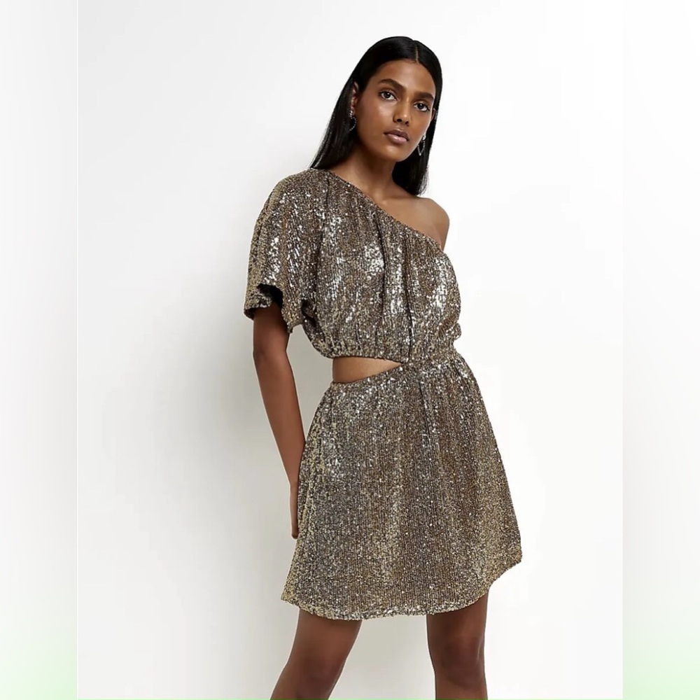 Fun party dress!  Gold sequin, one shoulder, cut out